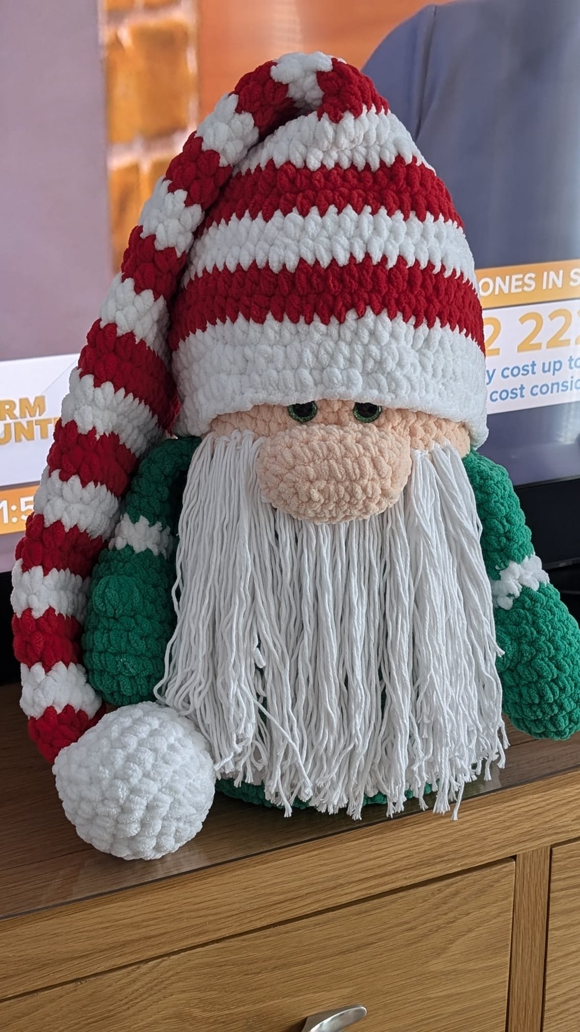 Crochet Christmas gnome, handmade by SnuggleStitch Creations