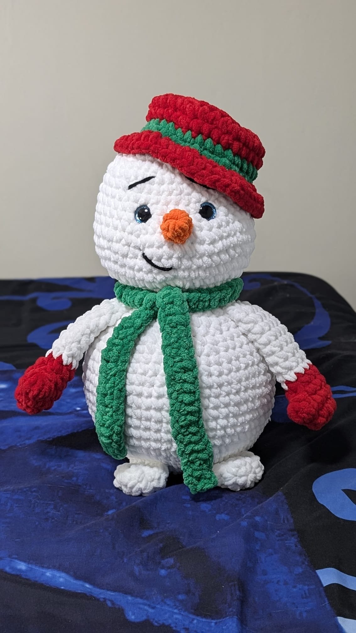 Crochet Christmas snowman, handmade by SnuggleStitch Creations