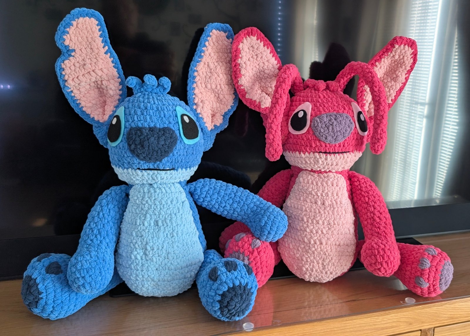 Blue and pink alien dolls, handmade by SnuggleStitch Creations